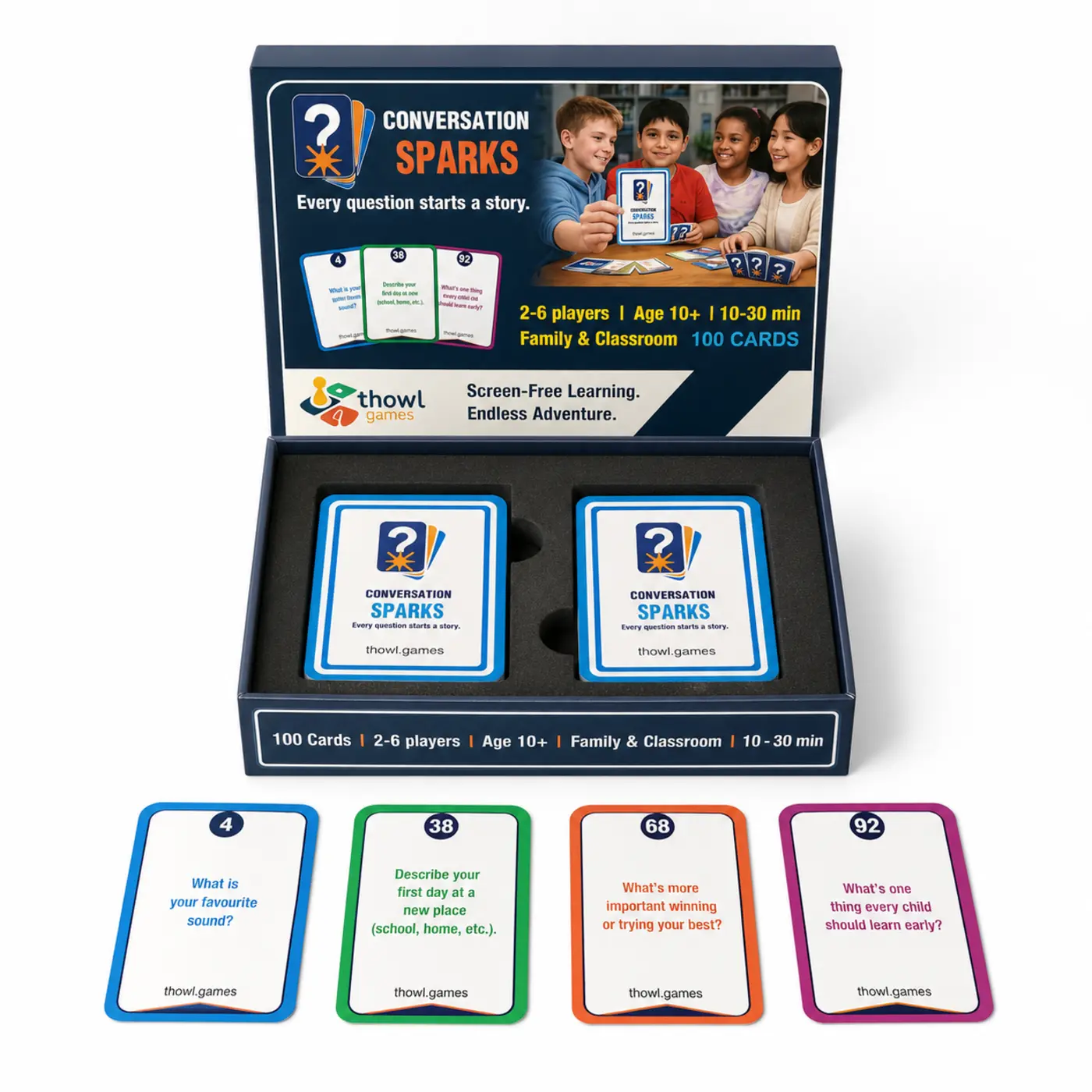 Clean studio view of the Conversation Sparks open box, two card decks and four example prompt cards
